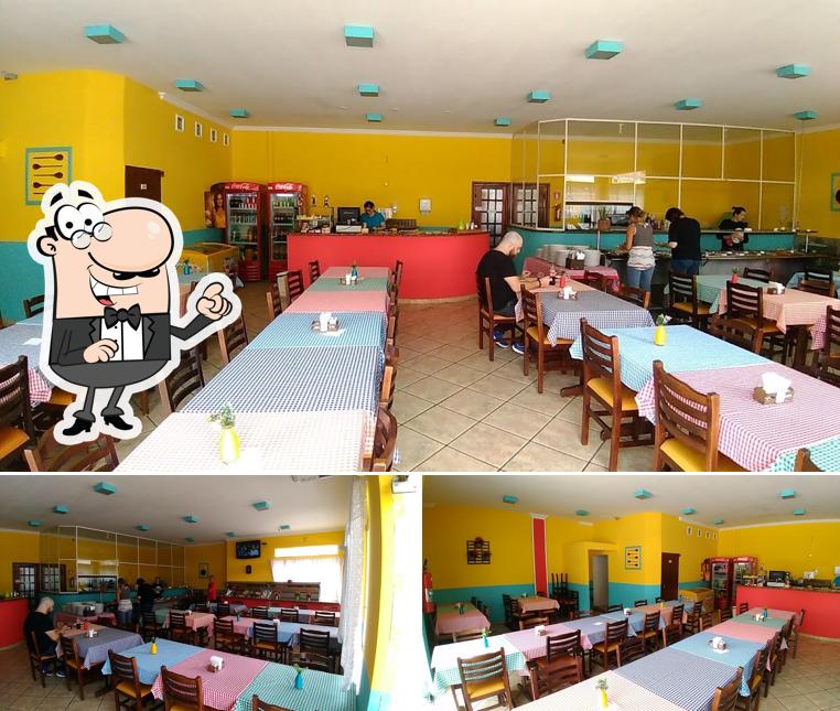 Sente em uma das mesas no Restaurante Rancho Da Parmegiana - Self Service, Marmitex, o melhor do Éden e Sorocaba