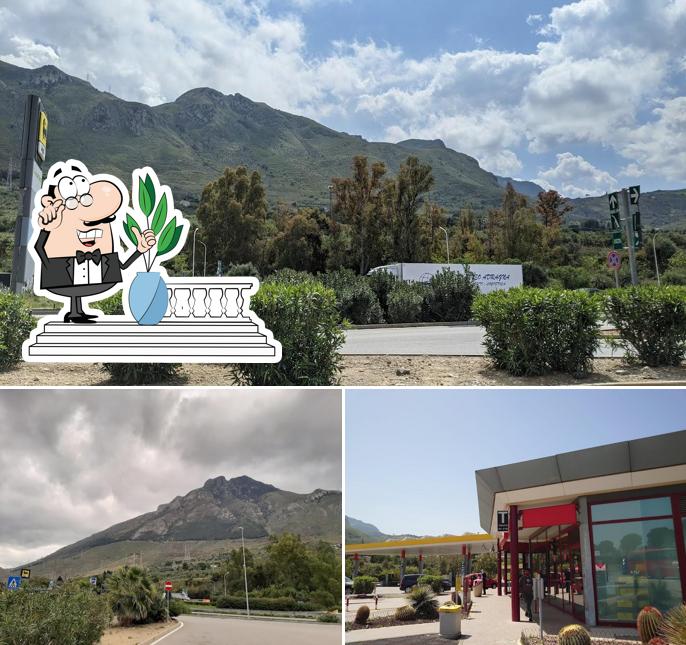 Puoi goderti l'aria fresca da seduto all'esterno di Autogrill Caracoli Nord