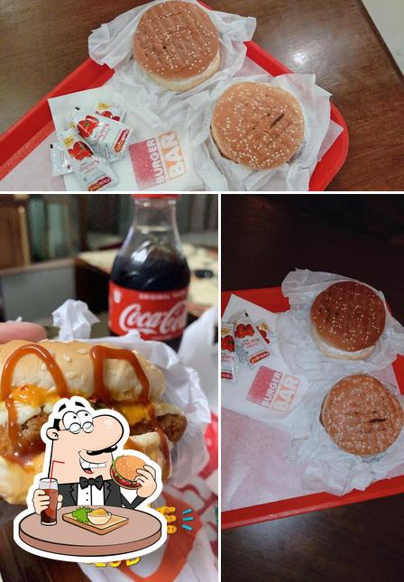 Order a burger at CAFE MG ( Burger Bar & Dominick Pizza )