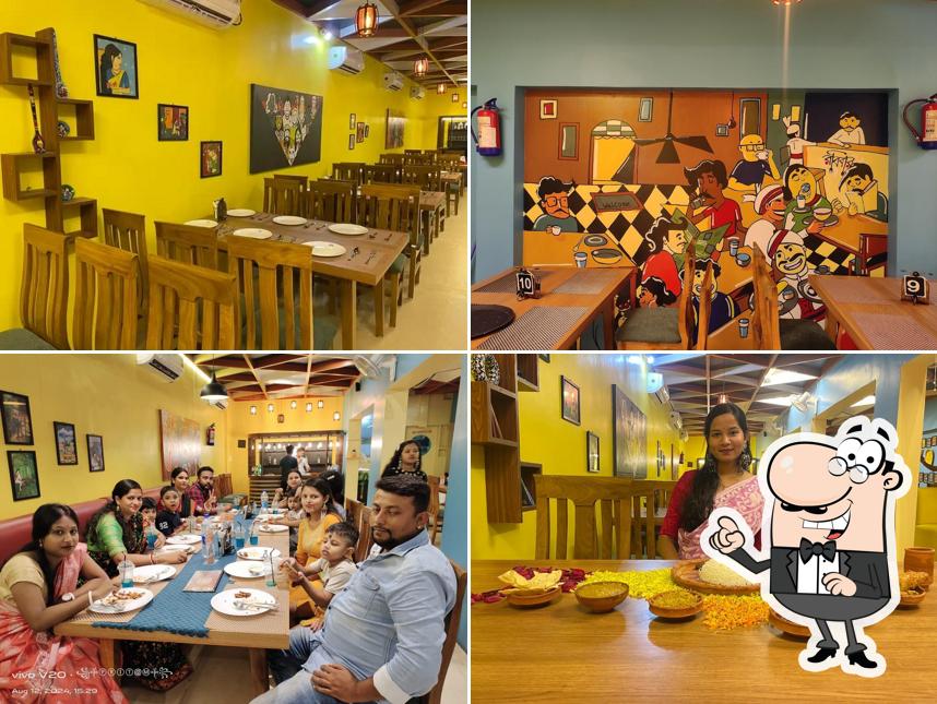 Take a seat at one of the tables at RABIBAR CAFE & RESTAURANT