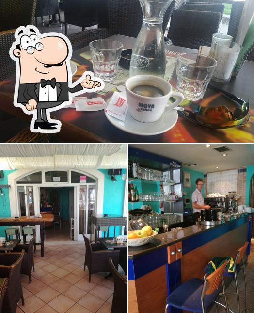 Dai un'occhiata agli interni di Dolce Vita Caffe & Cocktail Bar