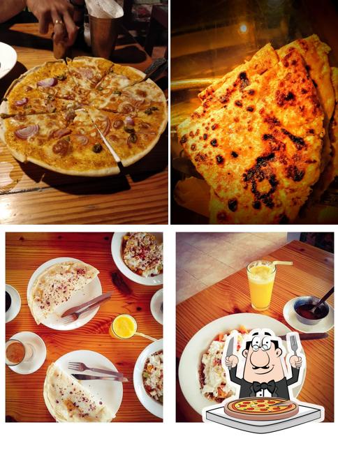 Pick pizza at The Sixth sense (retreat into heaven) the wonderful rooftop restaurant @inn seventh heaven