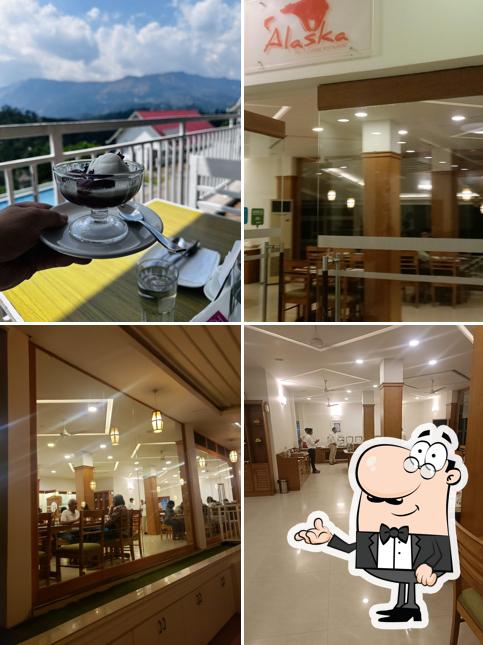 Take a seat at one of the tables at Alaska Restaurant