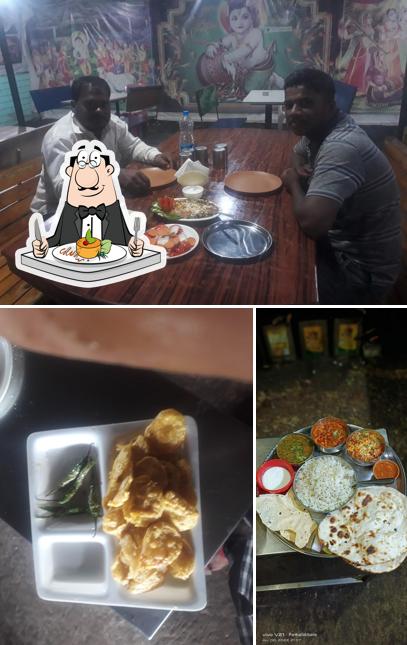 This is the photo depicting food and dining table at HOTEL VRUNDAVAN FAMILY GARDEN & RESTAURANTS