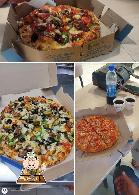 At Domino's Pizza Arjun Nagar, Rohtak, you can try pizza