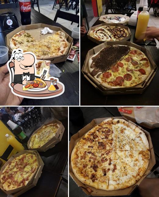 No Sr. Forneria Pizzas Marambaia, você pode degustar pizza