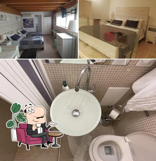 Siediti a un tavolo di Residenze Romano & SPA Albergo Diffuso in Centro a Foggia