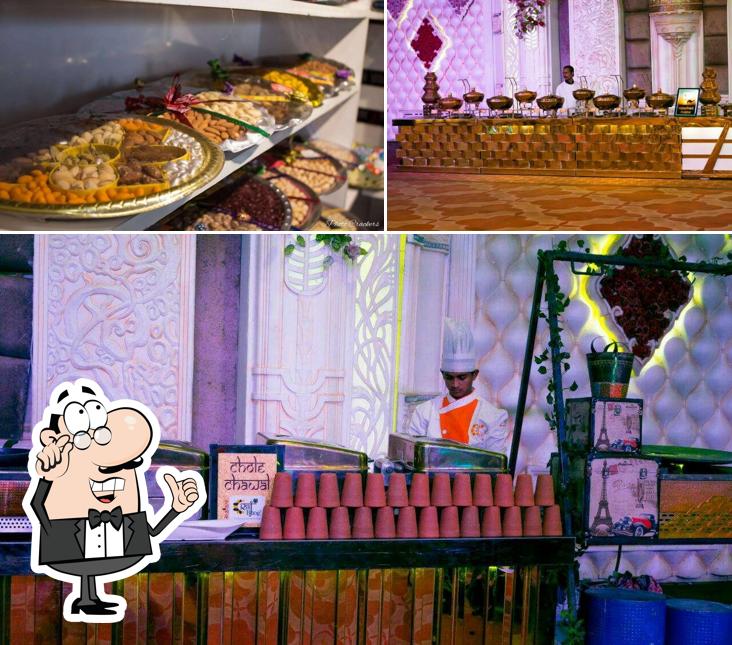 Take a seat at one of the tables at Raj Bhog