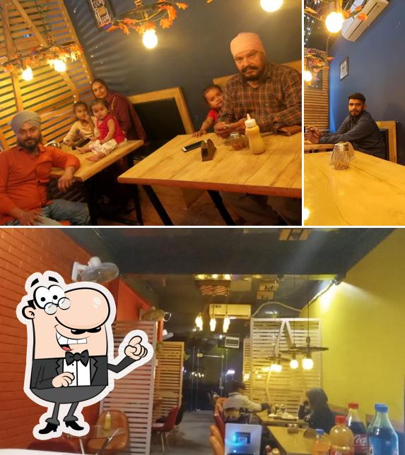 The interior of Roms Pizza Roorkee( MALVIYA CHOWK)