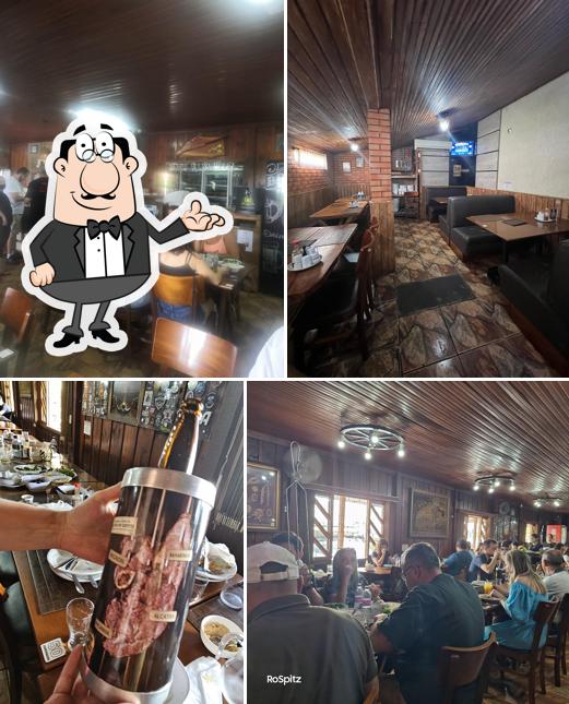 Sente em uma das mesas no Churrascaria Zancanaro