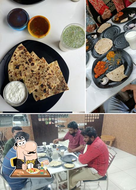 Take a look at the image showing food and interior at Mithu Marchu - The Restaurant & Cafe