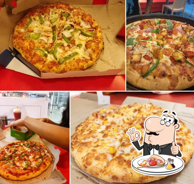 Get pizza at Domino's Pizza Jawahar Nagar, Ujjain
