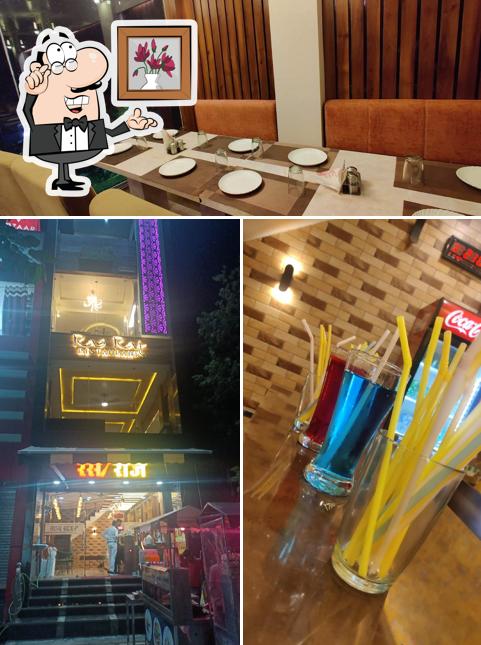 Take a seat at one of the tables at Ras Raj Restaurant